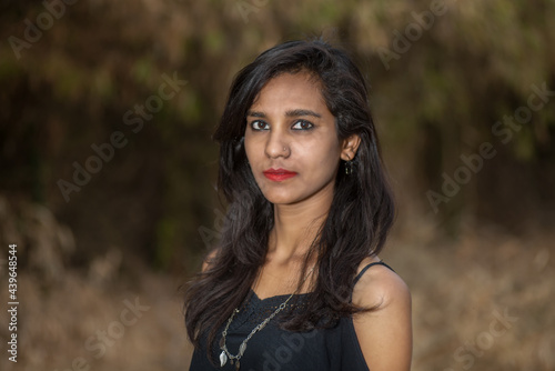 Beautiful young girl posing in a park, Portrait © Dip Photography