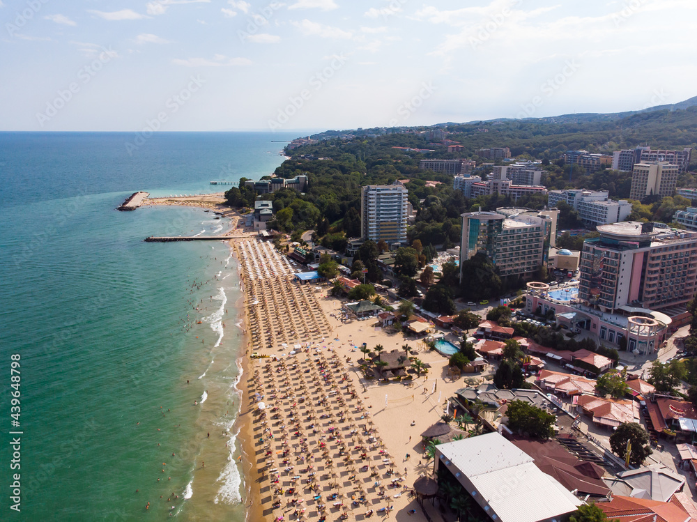 Aerial view of the beach and hotels in Golden Sands, Zlatni Piasaci. Popular summer resort near Varna, Bulgaria. Drone view from above. Summer holidays destination