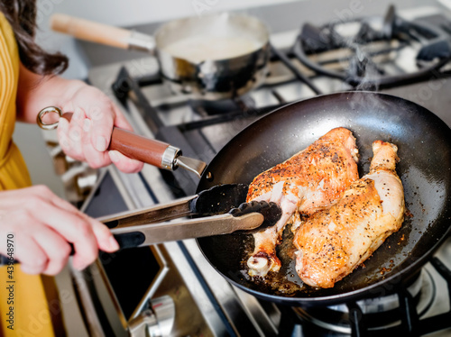 Non stick grey frying pan with wood handle photo