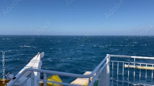 the ferry crossing the north sea between norway and denmark on open waters on a summer day
