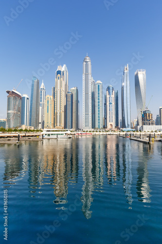 Dubai Marina and Harbour skyline architecture travel in United Arab Emirates water reflection portrait format