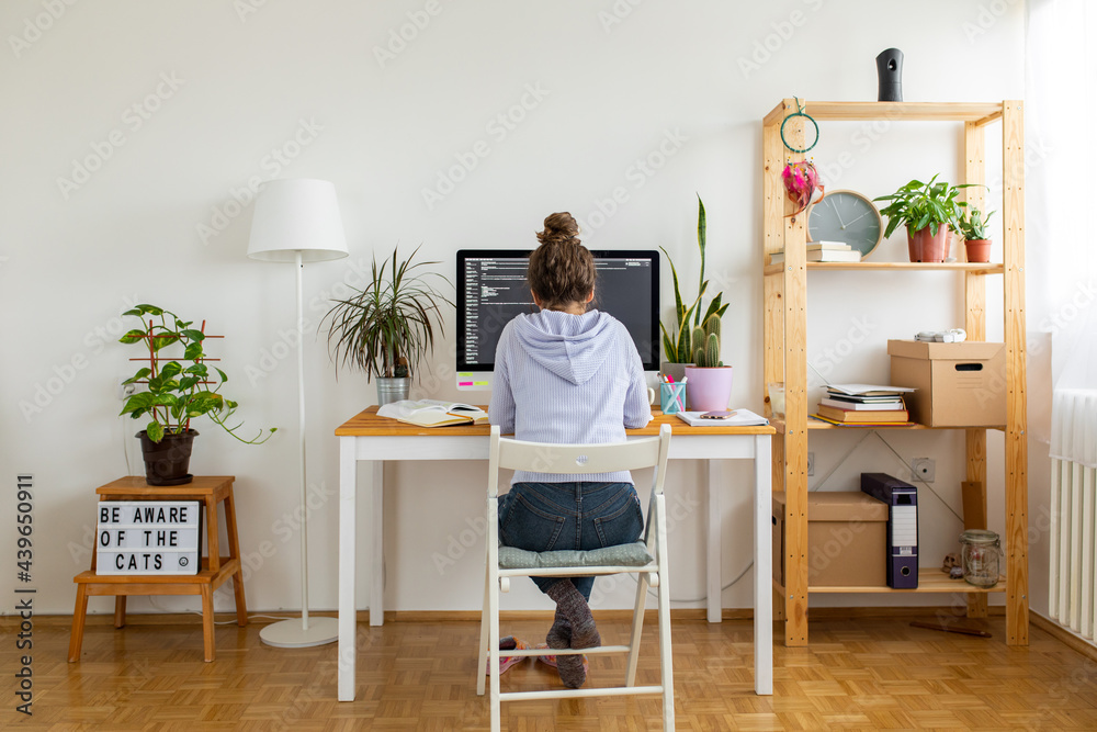 © Mihajlo Ckovric/Stocksy - Young woman studying at home