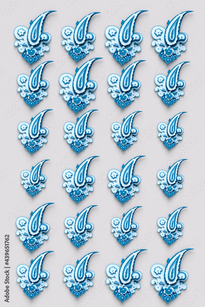vertical image of blue Paisley pattern on grey background vertical image of blue Paisley pattern on grey background