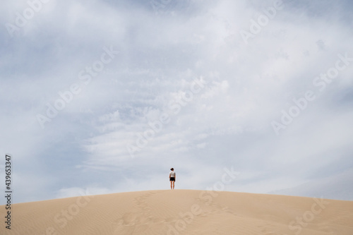 Young woman in deserted area photo