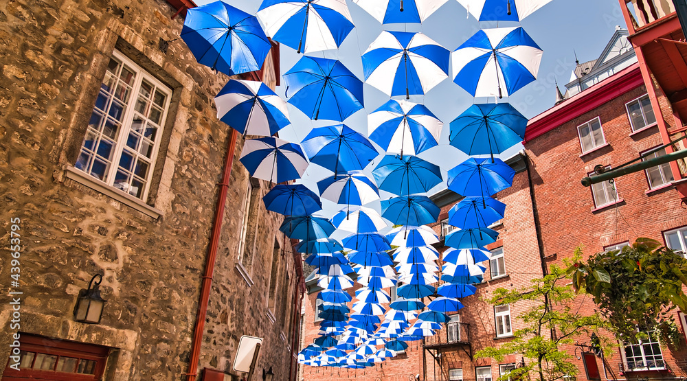 Obraz premium Lot of Umbrellas in Petit Champlain street Quebec city Canada
