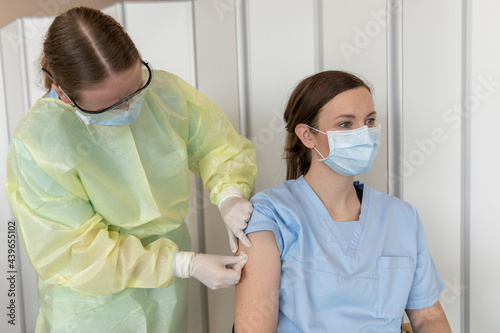 Nurse after administering the coronavirus vaccine