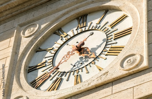 Rome, Ostiense neighborhood. Detail of the big clock located in the bell tower of Basilica of Saint Paul Outside the Walls.