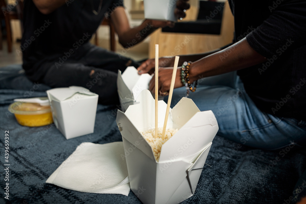 © Sean Locke/Stocksy - Loft: Box Of Rice With Chopsticks