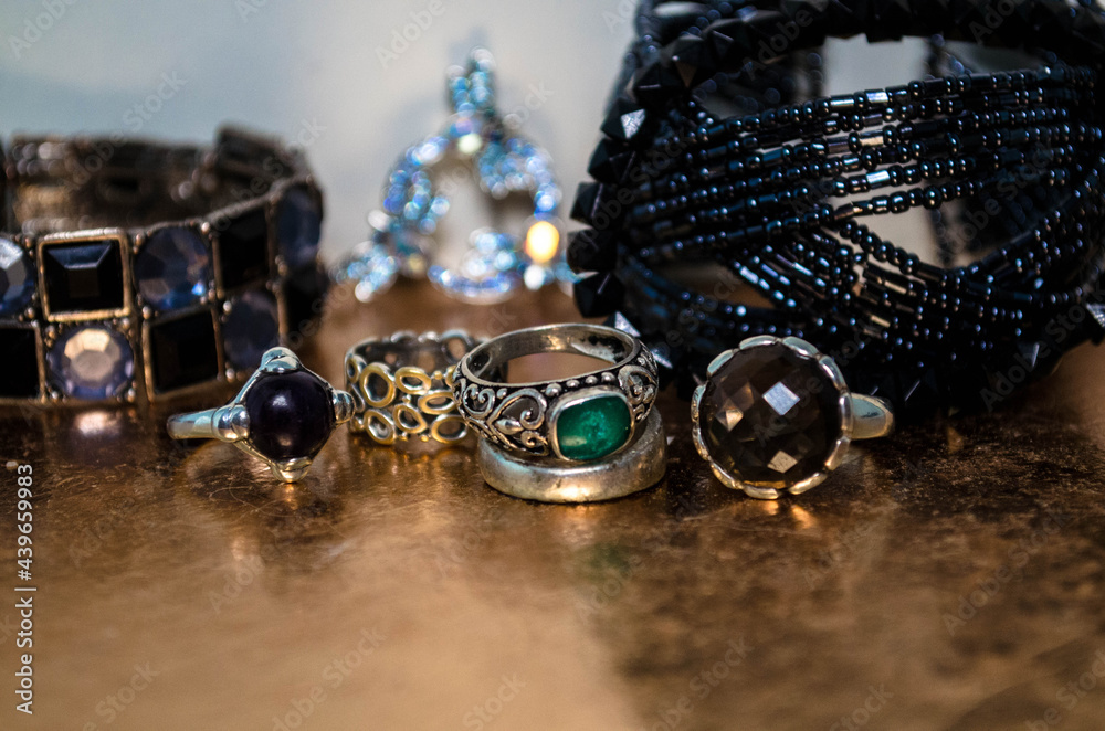 Old metal rings with precious and mineral stones, old bracelets and necklaces
Old metal rings with precious and mineral stones, old bracelets and necklaces