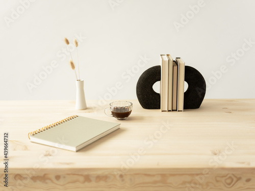Minimal table scene with books