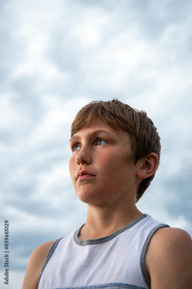 Portrait of Teen Boy with Clouds Portrait of Teen Boy with Clouds