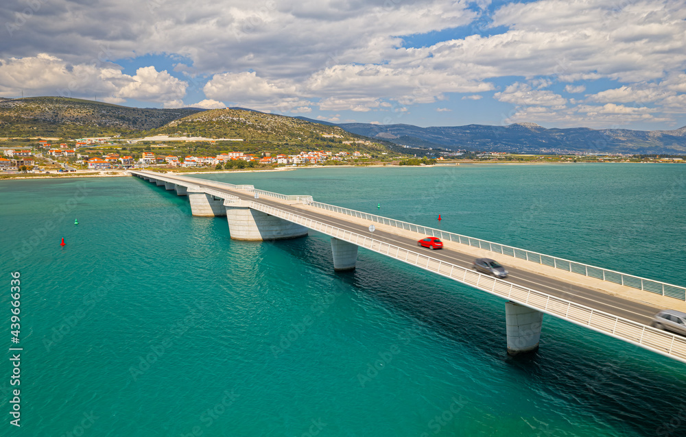 Aerial view of a long bridge above a sea, island Ciovo in Croatia Aerial view of a long bridge above a sea, island Ciovo in Croatia