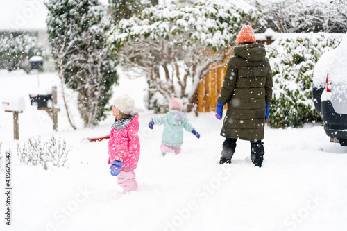 Family Together In Snow photo