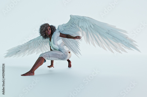 African american woman with white angel wings photo