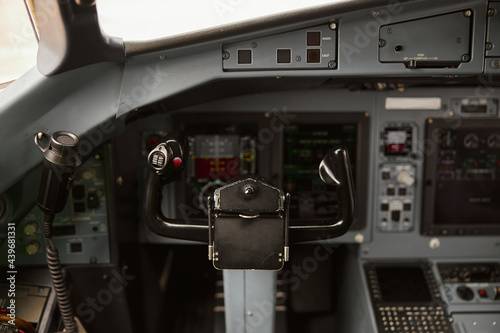 Steering wheel in cockpit of passenger airplane