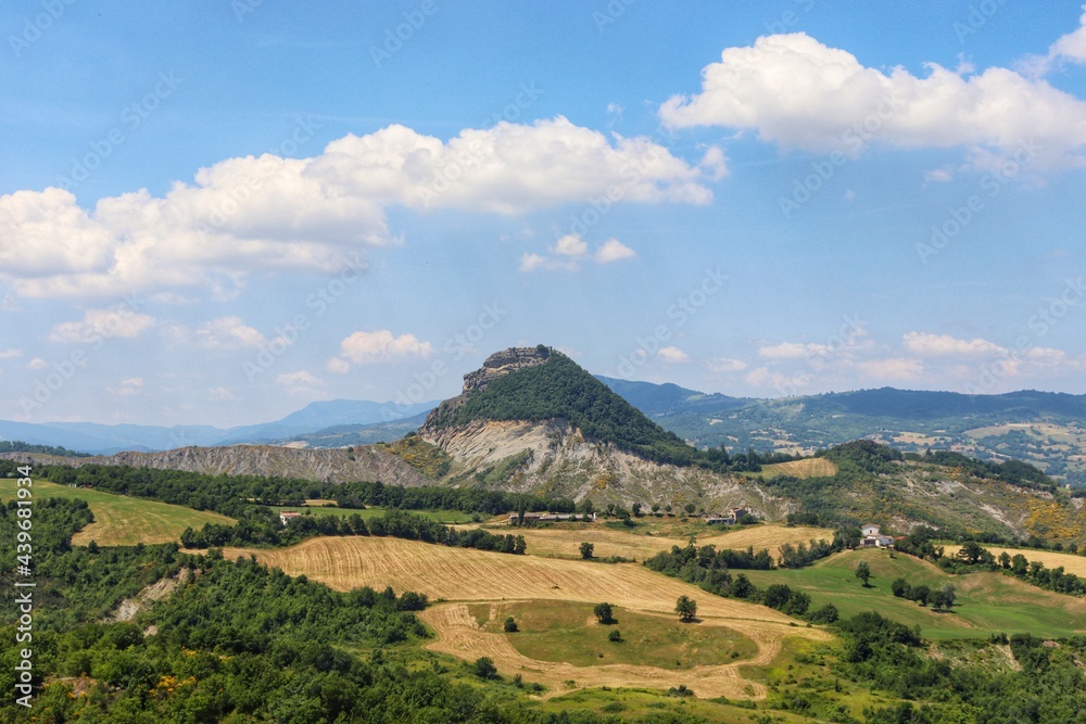 Beautiful landscape view against nice blue and clouds sky during summer sunny day in San Leo,Privince of Rimini,Italy