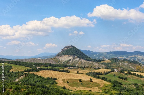 Beautiful landscape view against nice blue and clouds sky during summer sunny day in San Leo,Privince of Rimini,Italy