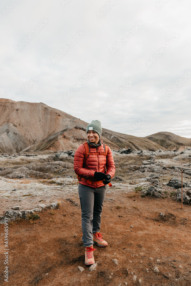 A woman hiker trekking the Laugavegur trail in Iceland. A woman hiker trekking the Laugavegur trail in Iceland.