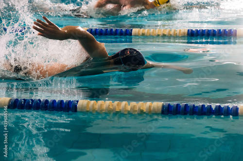 young man training in the pool