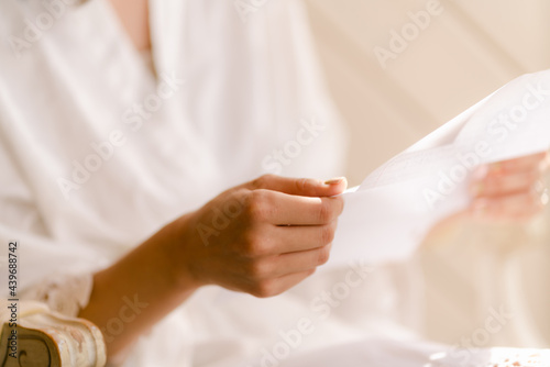 bride reading letter photo