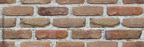 Brick red wall. background of a old brick house. Seamless texture. Perfect tiled on all sides.