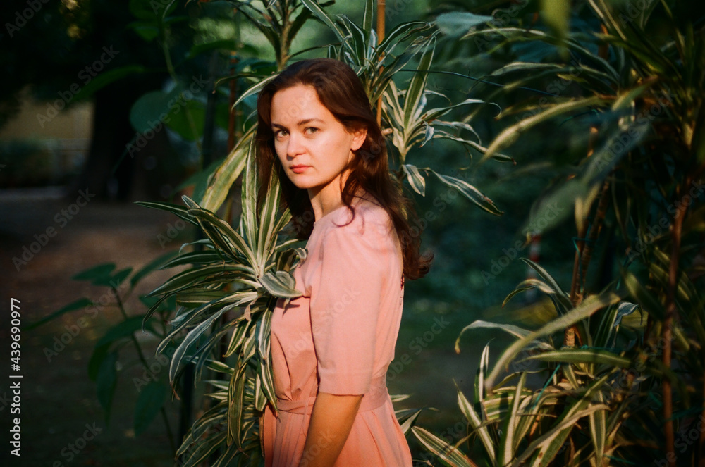 A beautiful portrait a woman in a garden A beautiful portrait a woman in a garden