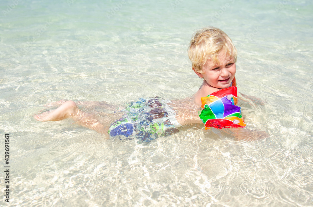Little Boy swimming in the Caribbean Sea Little Boy swimming in the Caribbean Sea