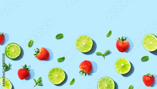 Fototapeta Naklejka Na Ścianę i Meble -  Fresh limes and strawberries with mints