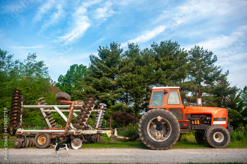 Little Boy on Tractor Wheel photo