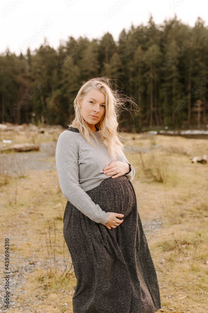 Pregnant mother holding your tummy Pregnant mother holding your tummy
