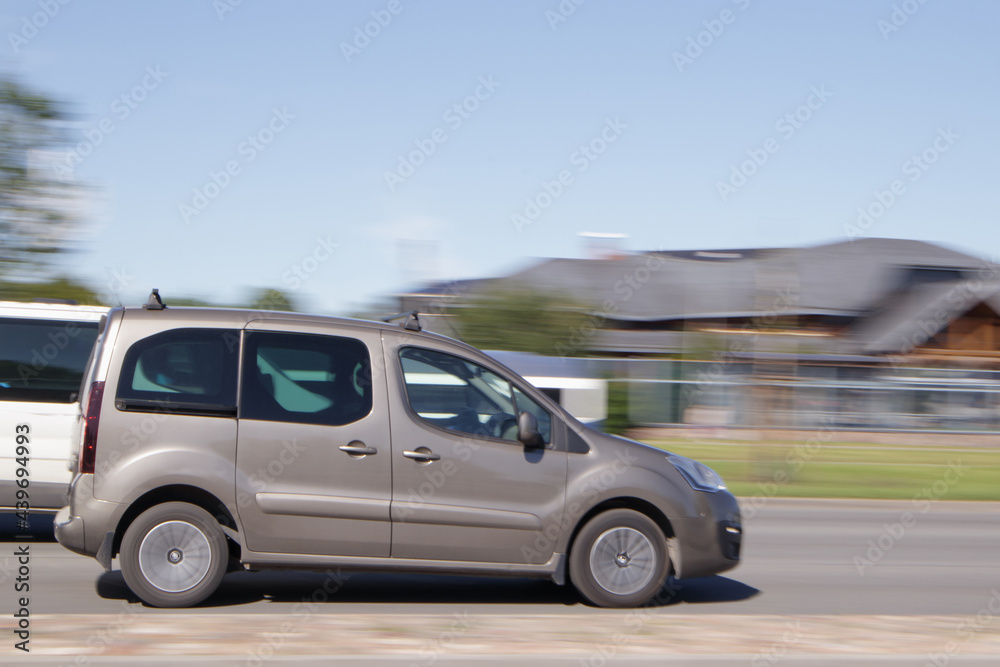 Commercial vehicle for the transport of small loads and passengers. Motion blur