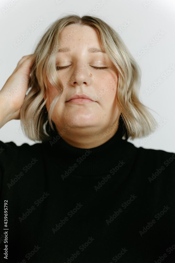 Young queer woman fashion in studio
