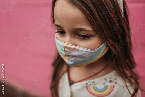 Close up portrait of child with mask on photo