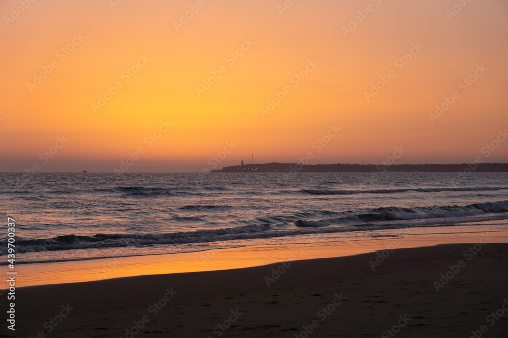 Cadiz beach at sunset in the golden hour Cadiz beach at sunset in the golden hour