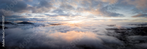 Aerial above a cloud inversion at sunrise lake district photo