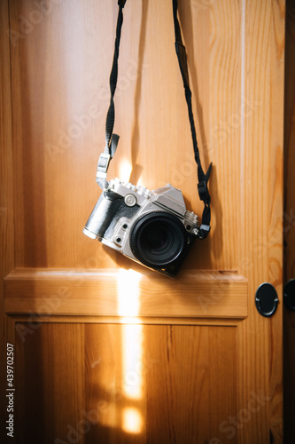 vintage camera hanging on the door