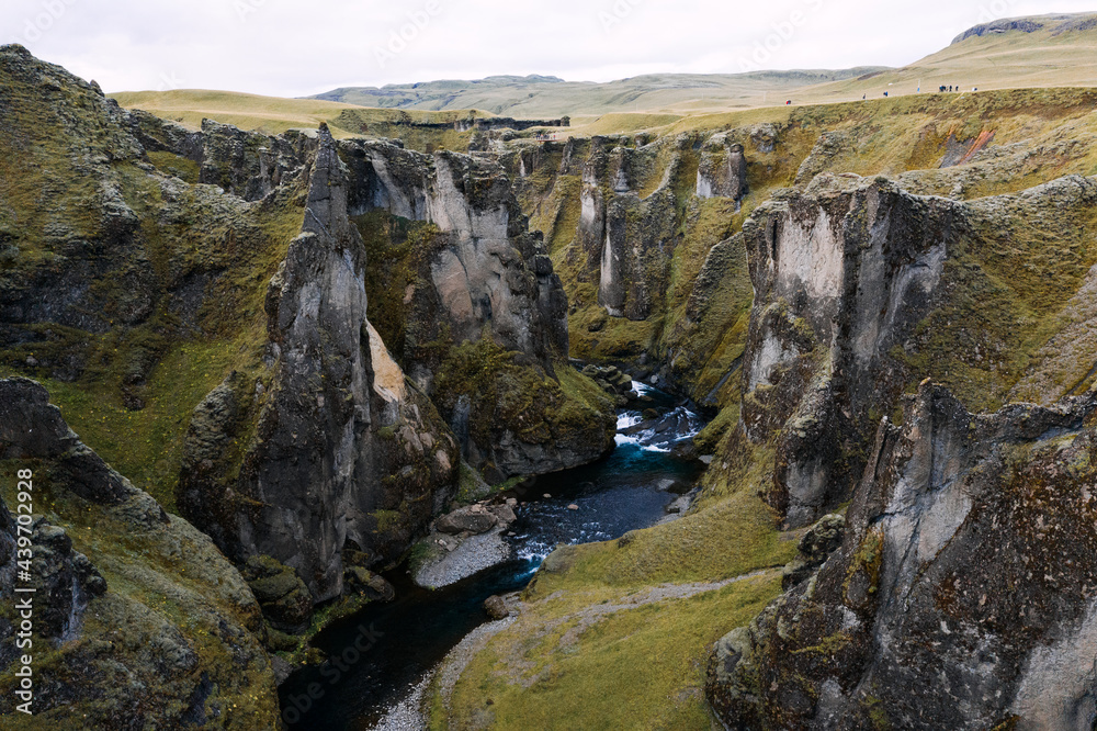 Aerial / Drone shot of Fjaðrárgljúfur canyon in Iceland Aerial / Drone shot of Fjaðrárgljúfur canyon in Iceland