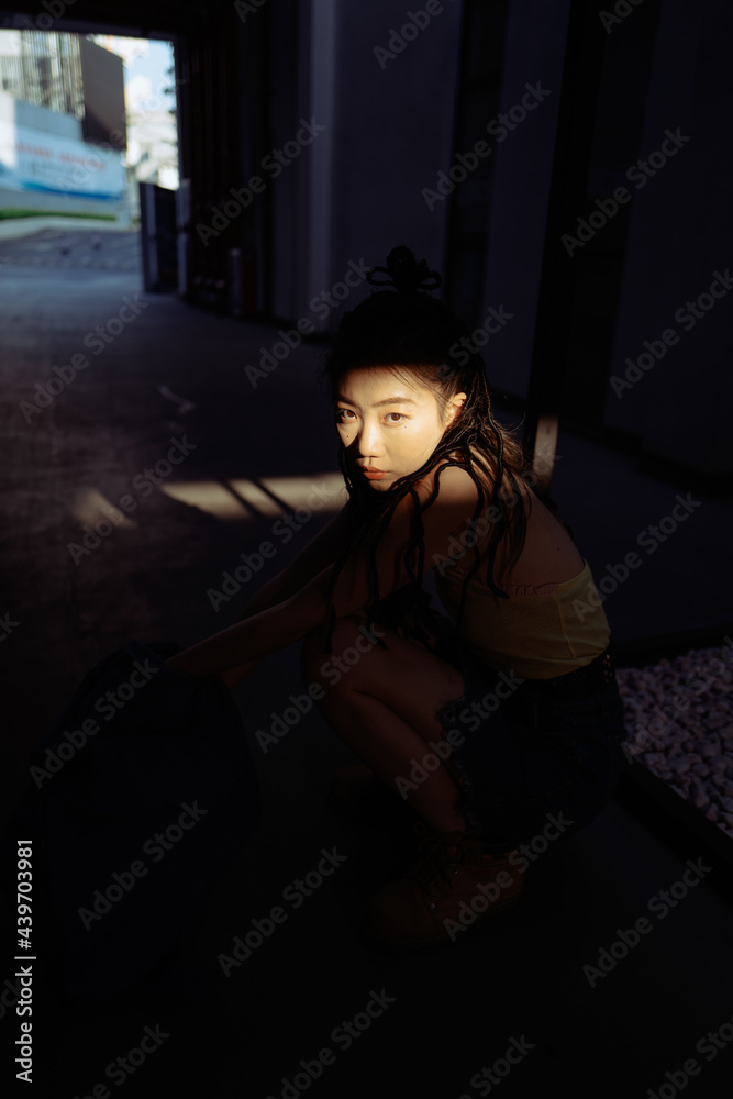 Fashion young Asian woman on city street Fashion young Asian woman on city street