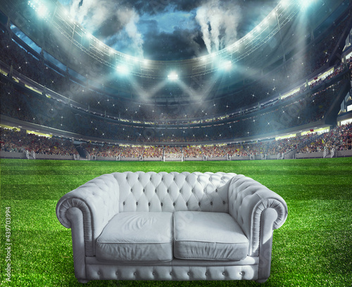 Tableau sur toile White sofa at the center of the soccer field