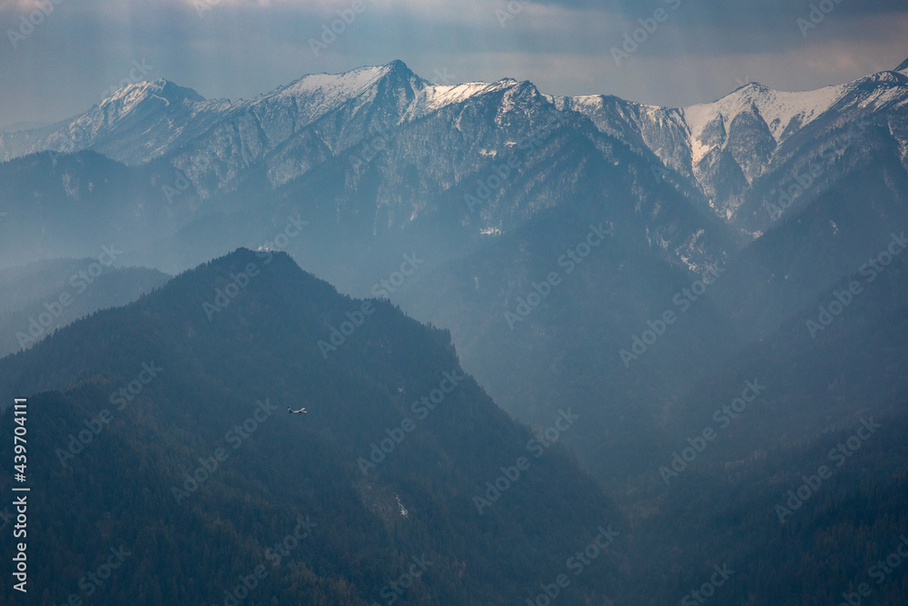 An airplane flying in the himalayas. An airplane flying in the himalayas.