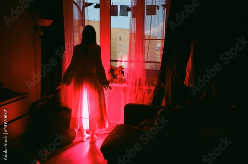 Woman in red glow
 photo