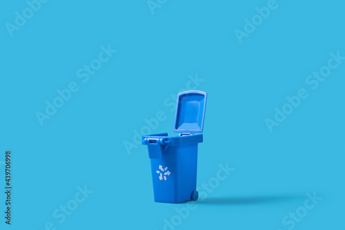 Blue trash can photo