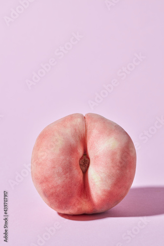 Ripe peach with sexy concept photo