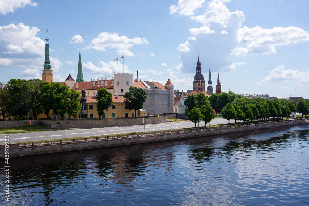 Summer panorama with the clouds of the city of Riga from the Daugava embankment
