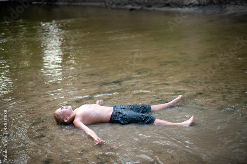 Boy in a River