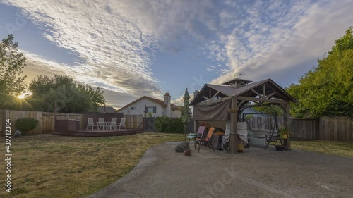 Clouds dancing across the sky seen from the backyard