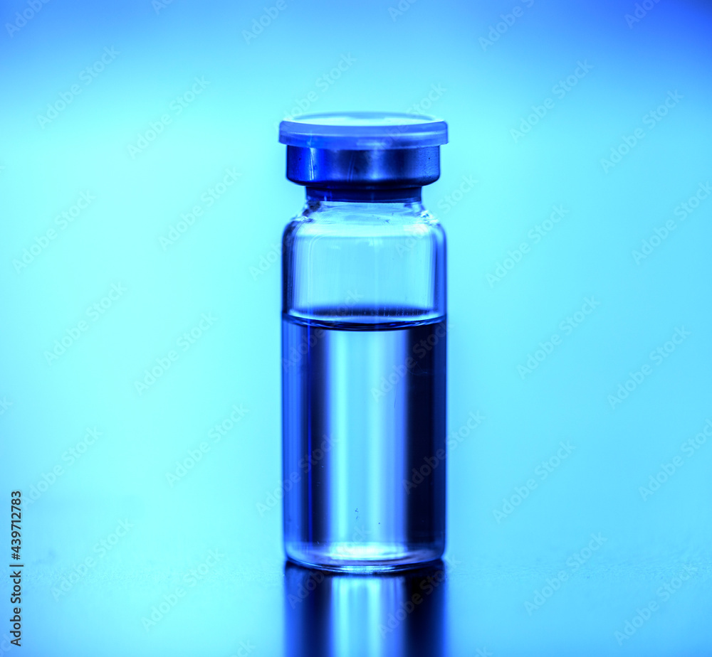 blue glass bottles. Vaccine bottle. Medicine. Medical. blue glass bottles. Vaccine bottle. Medicine. Medical.