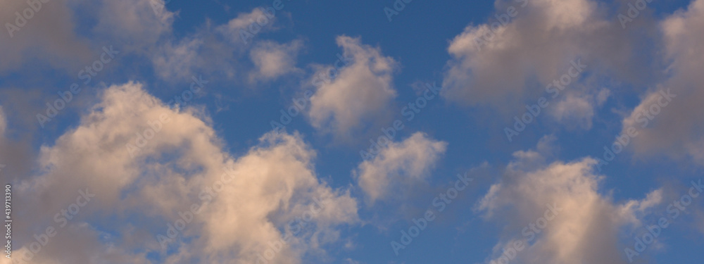 Blue sky with white clouds. Panorama. Banner with space for text