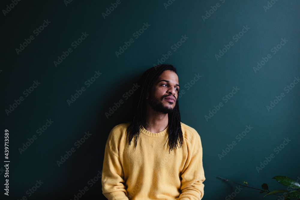 Portrait of man leaning against the wall Portrait of man leaning against the wall