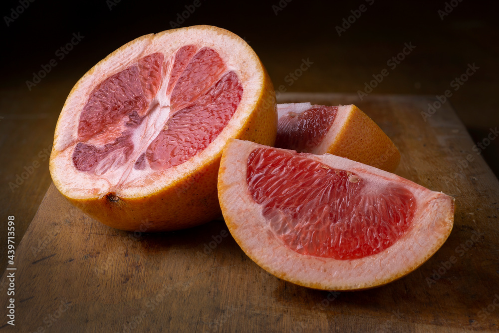 pink grapefruit fruit cut into wedges pink grapefruit fruit cut into wedges